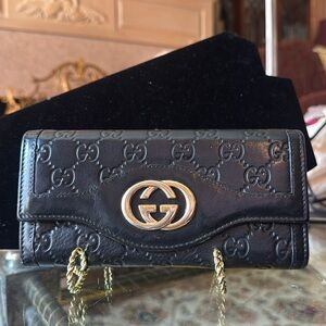 Gucci Black Wallet with Gold Accents
